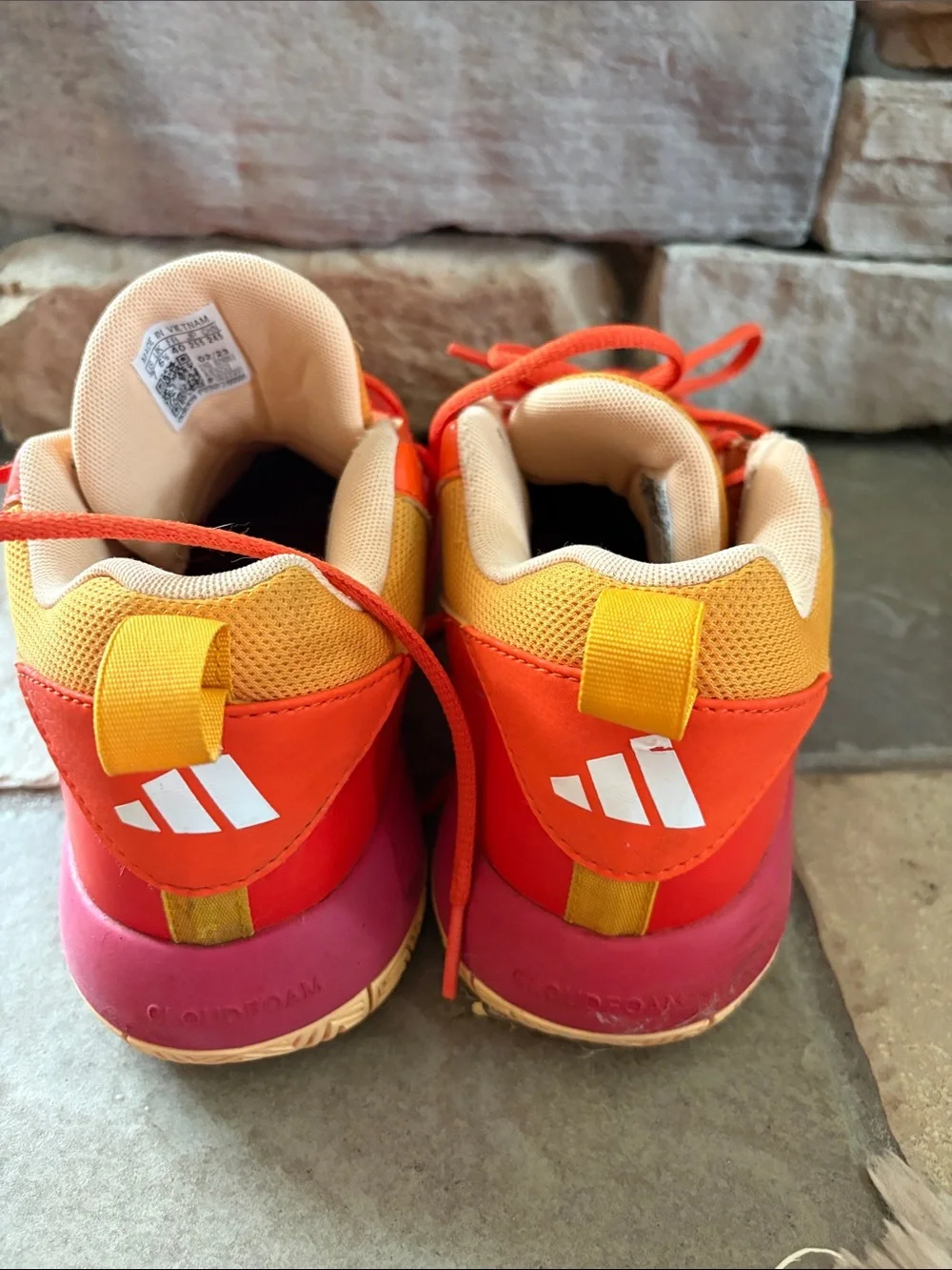 Adidas orange athletic shoes